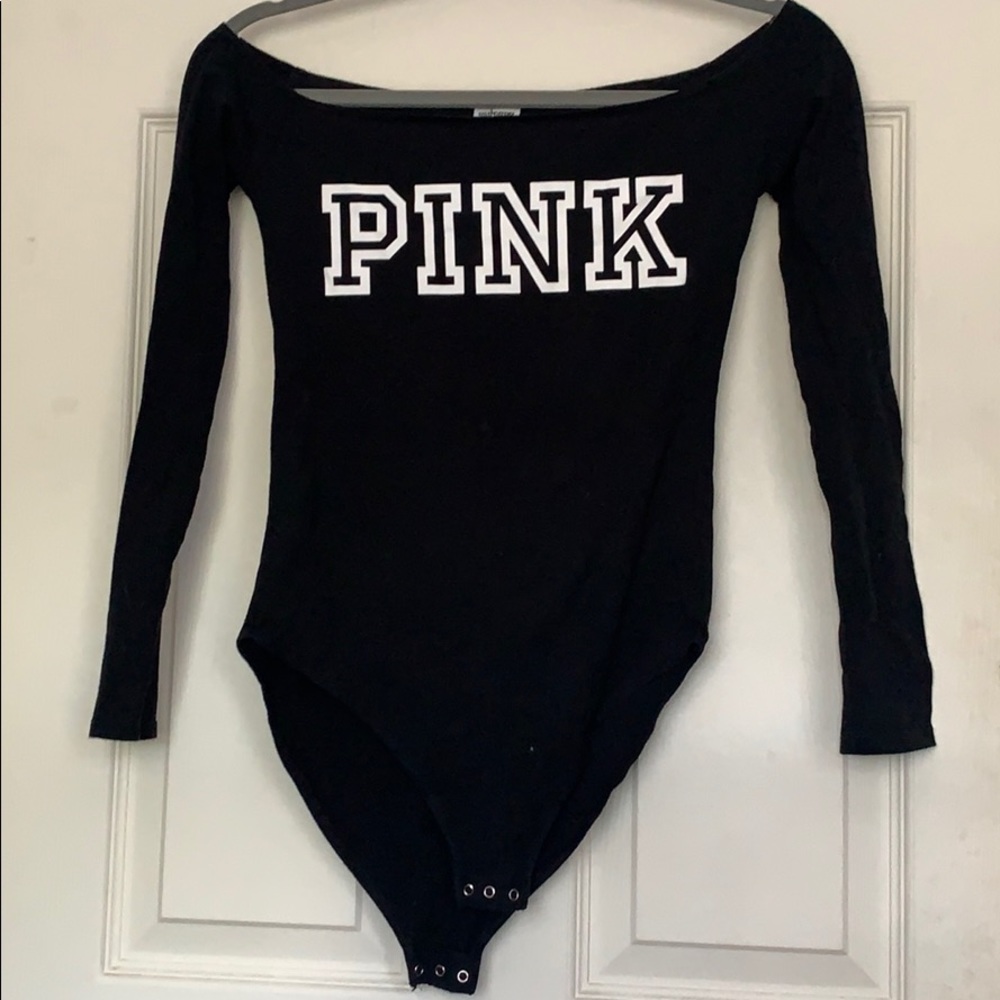 A pink black bodysuit